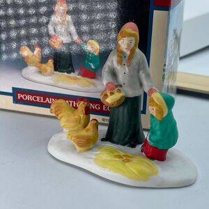 Vintage 1996 Lemax “Porcelain Gathering Eggs” village collection.